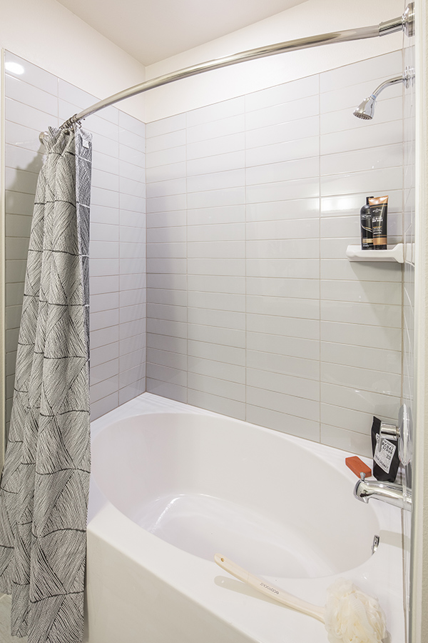 LEED-rated apartment bathroom with water-efficient shower head
